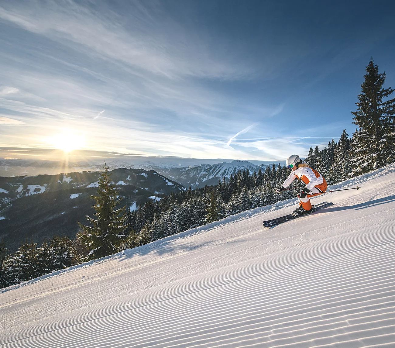 Übergossene Alm - Paar bei der Abfahrt Winter