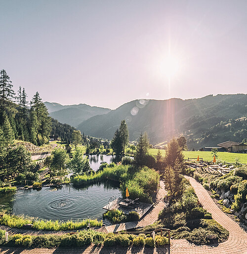 Übergossene Alm - Badesee Sommer Sonnenuntergang
