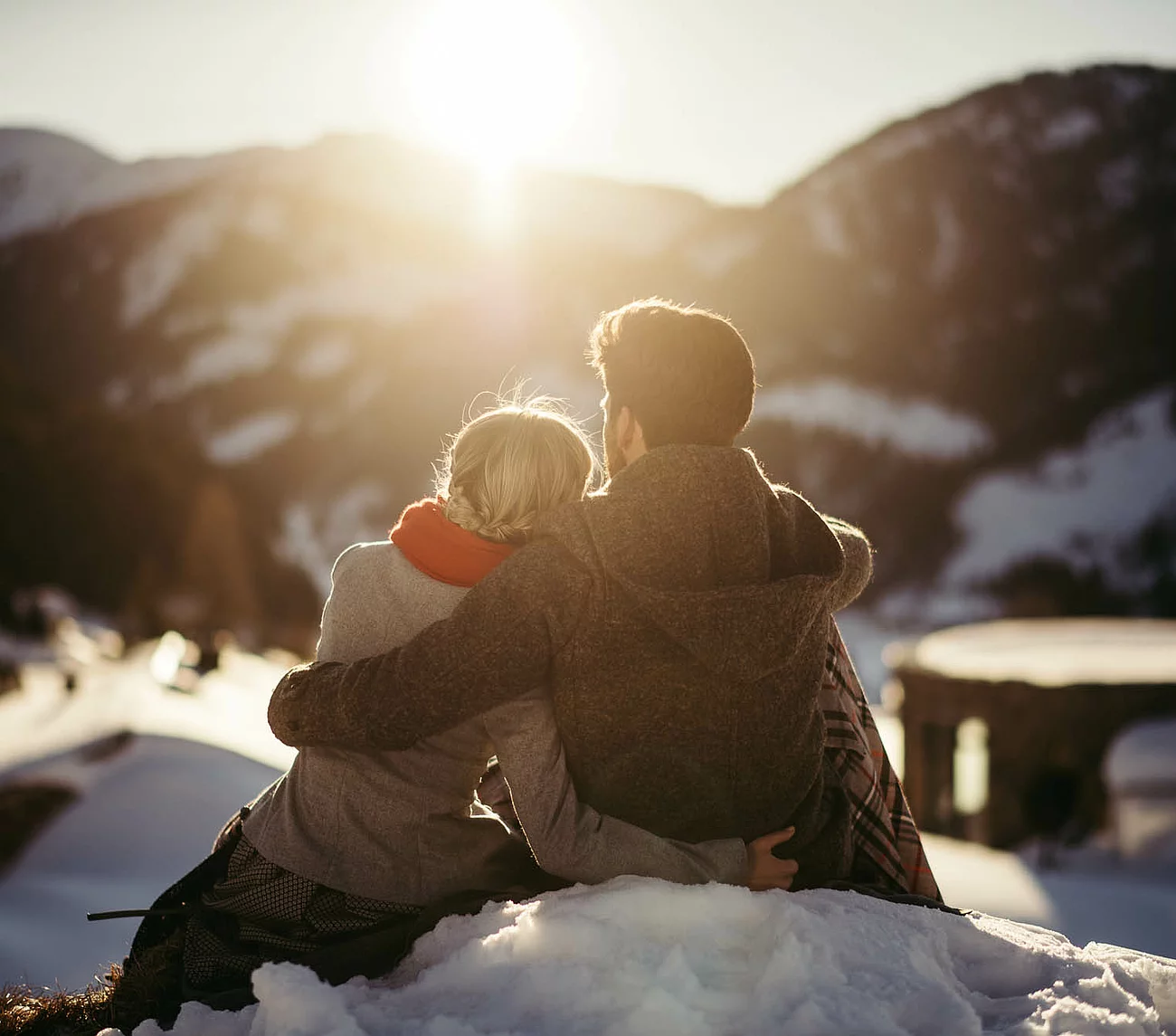 Übergossenen Alm - Paar im Schnee Sonnenuntergang